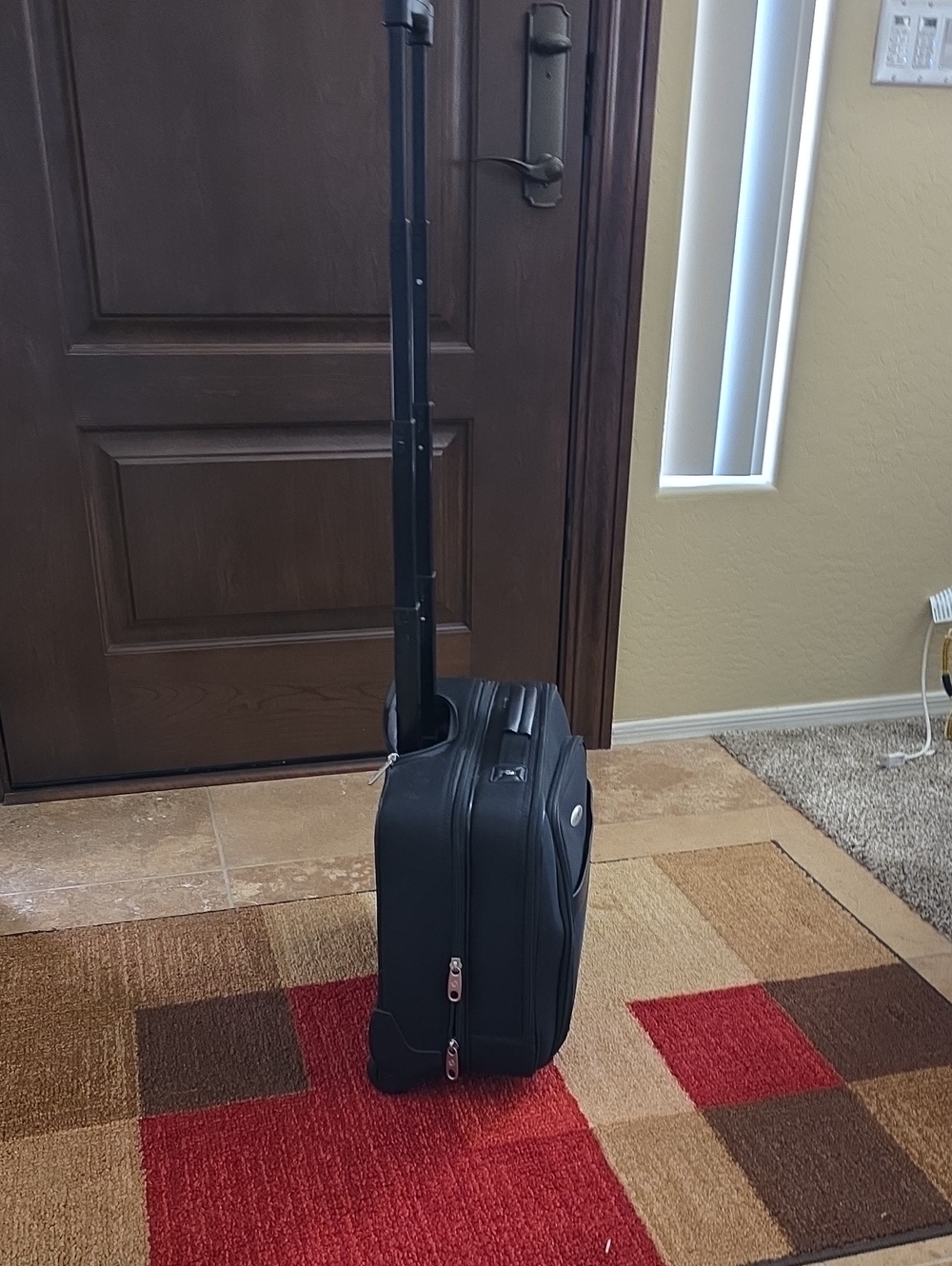 Samsonite Black Rolling Travel Carry-On